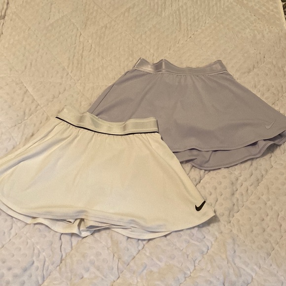 Nike Dresses & Skirts - Two Nike flouncy tennis skirts. Women’s size XS, perfect for tennis and summer!